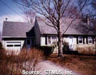 a front view of house with a yard