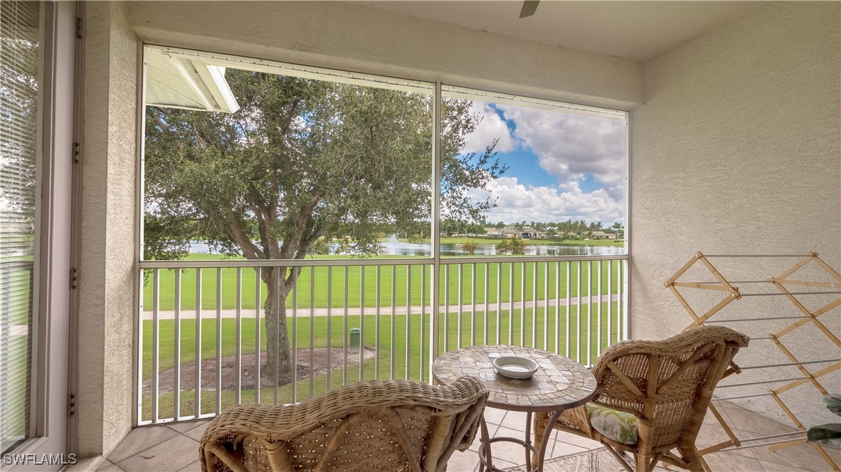 a view of a balcony with furniture and outside view