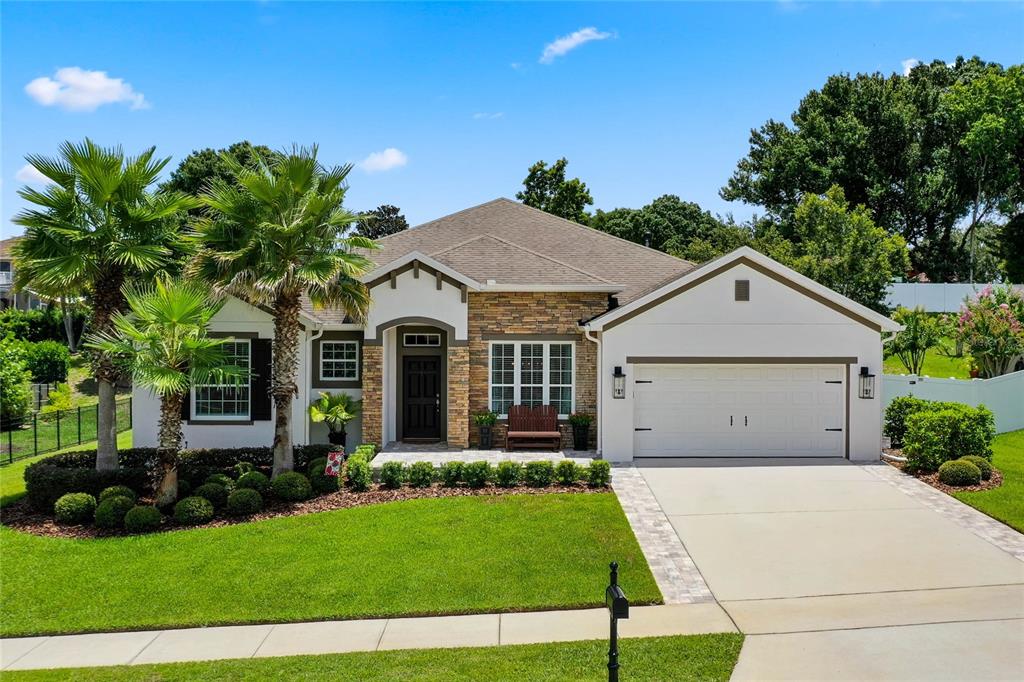 a view of a house with a yard