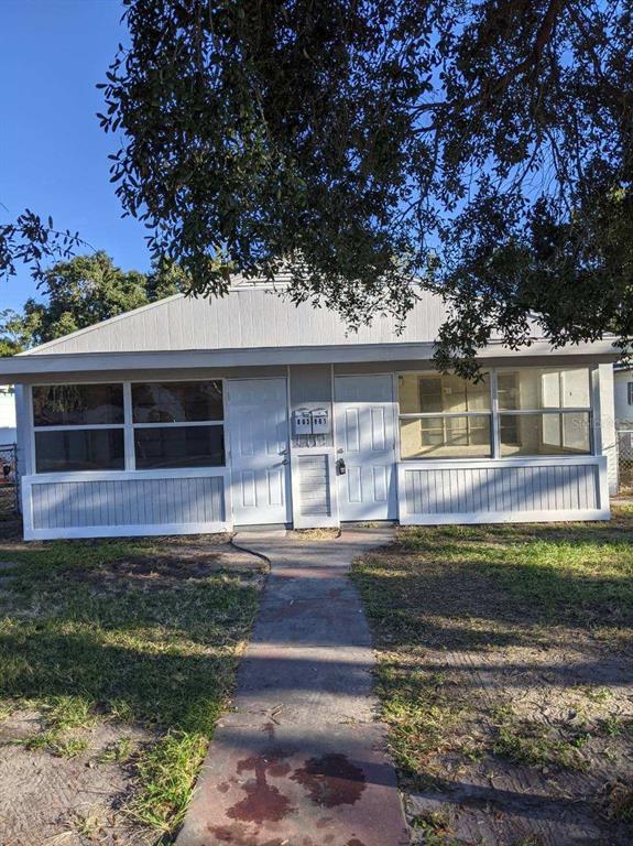 front view of a house with a yard