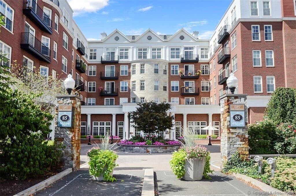 a front view of a multi story residential apartment building