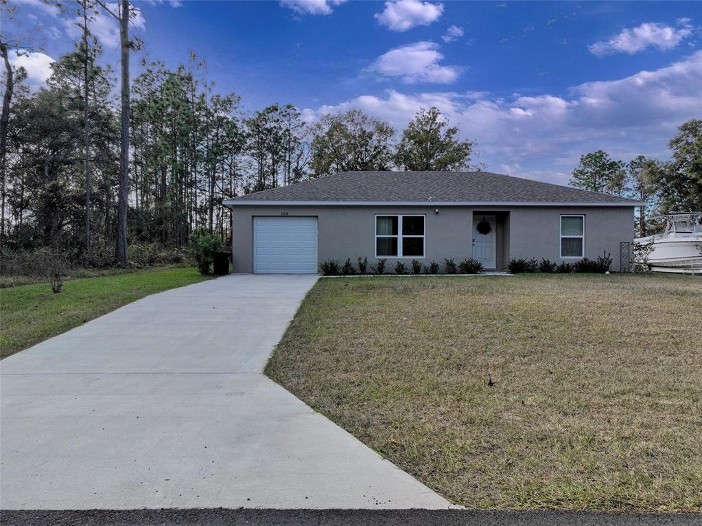 front view of house with a yard