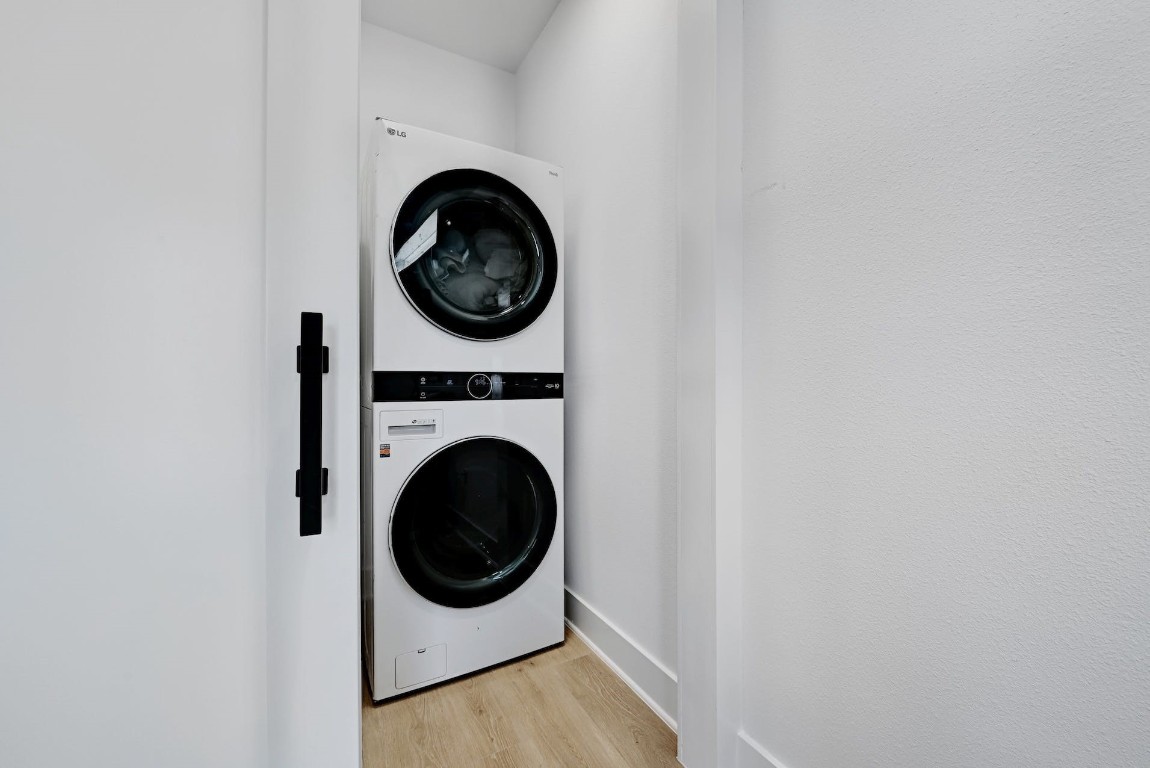 Silver LG Washer and Dryer Under Wood Countertop - Transitional - Laundry  Room