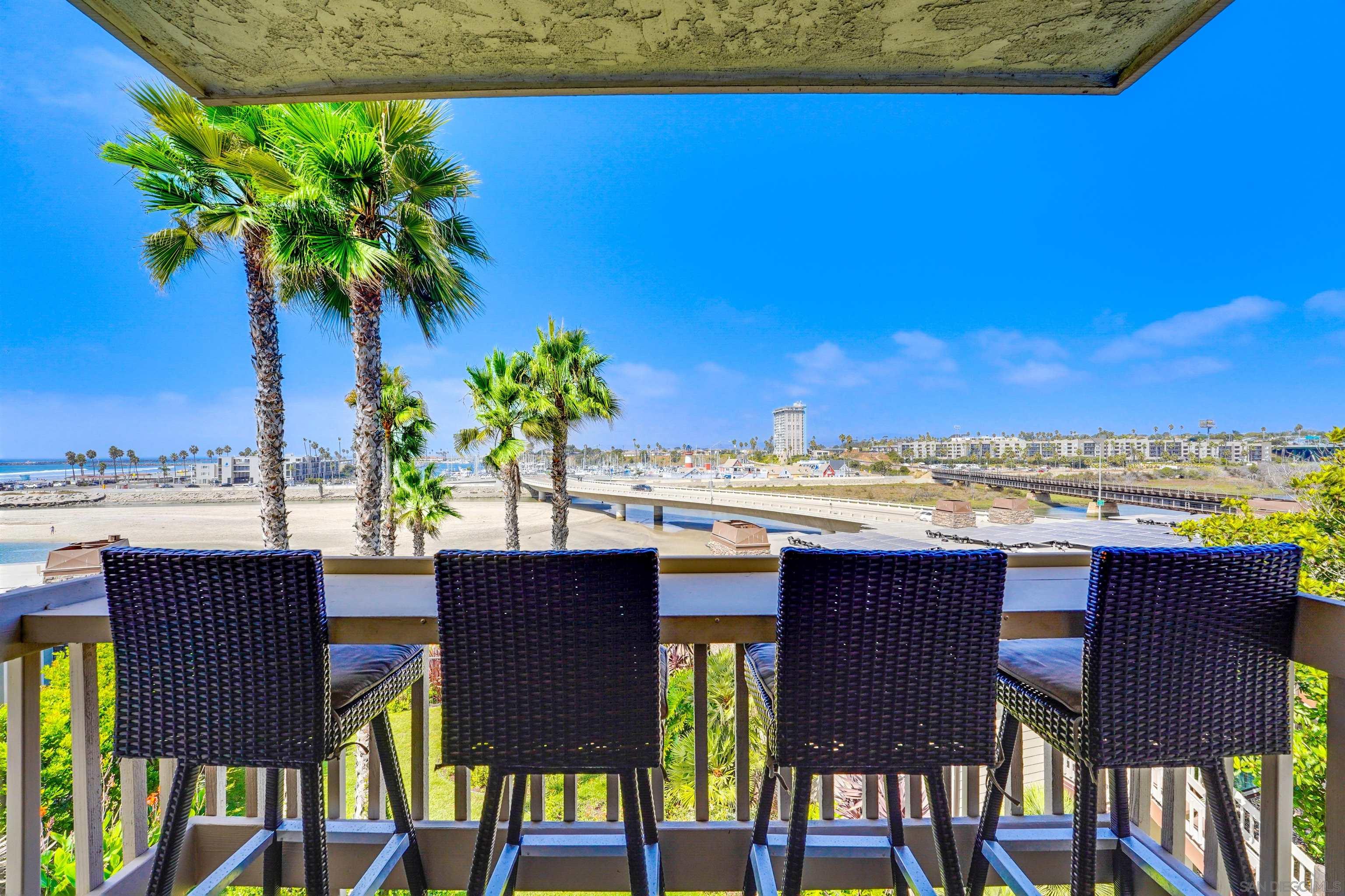 a view of a terrace with furniture and a potted plant