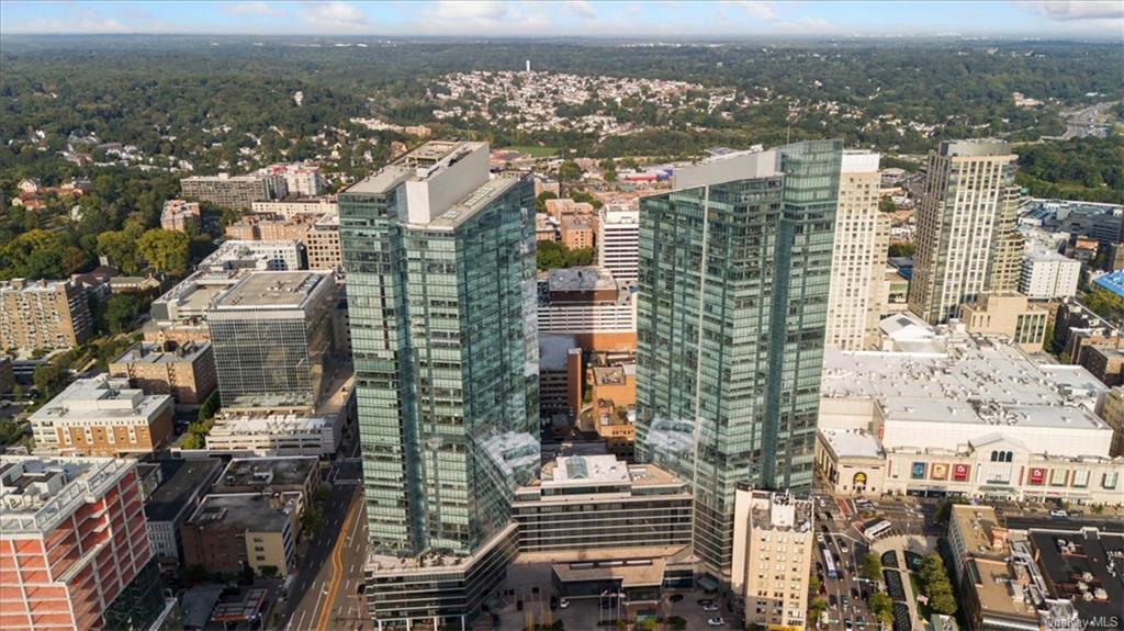 a view of a city with tall buildings