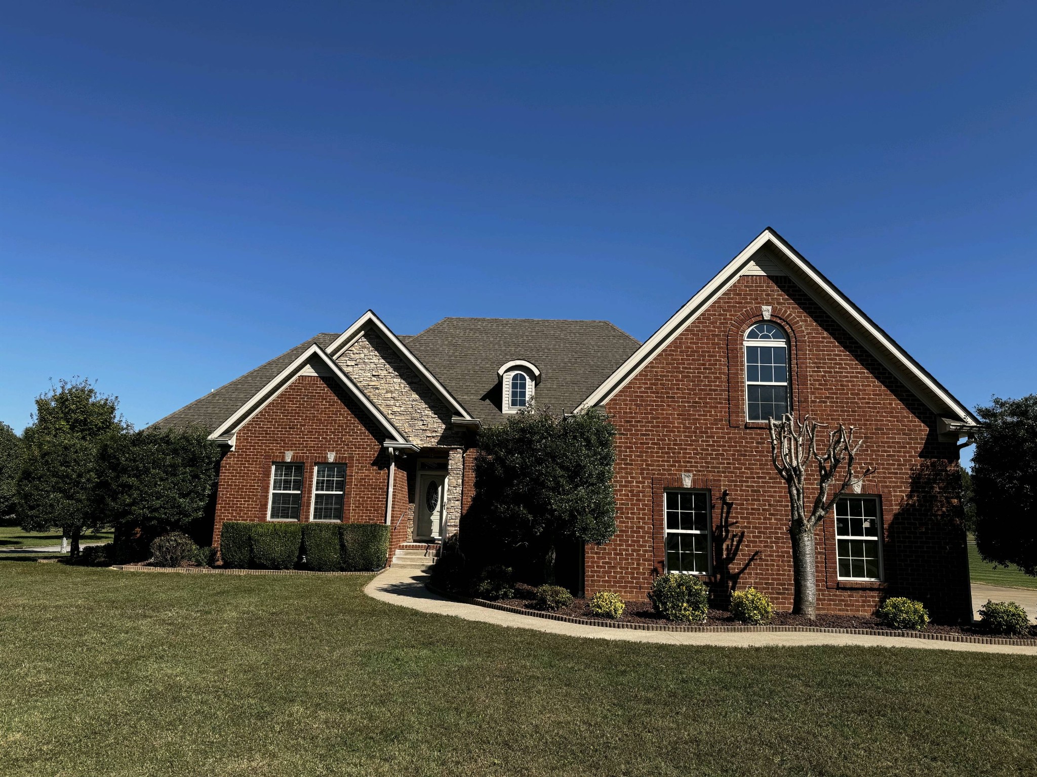 a front view of house with a yard