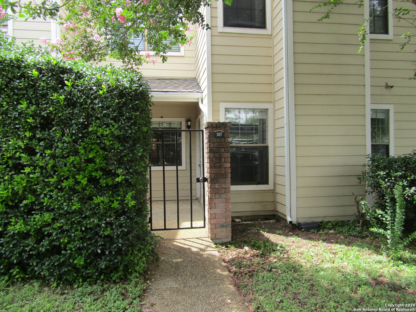 a view of a pathway of the house