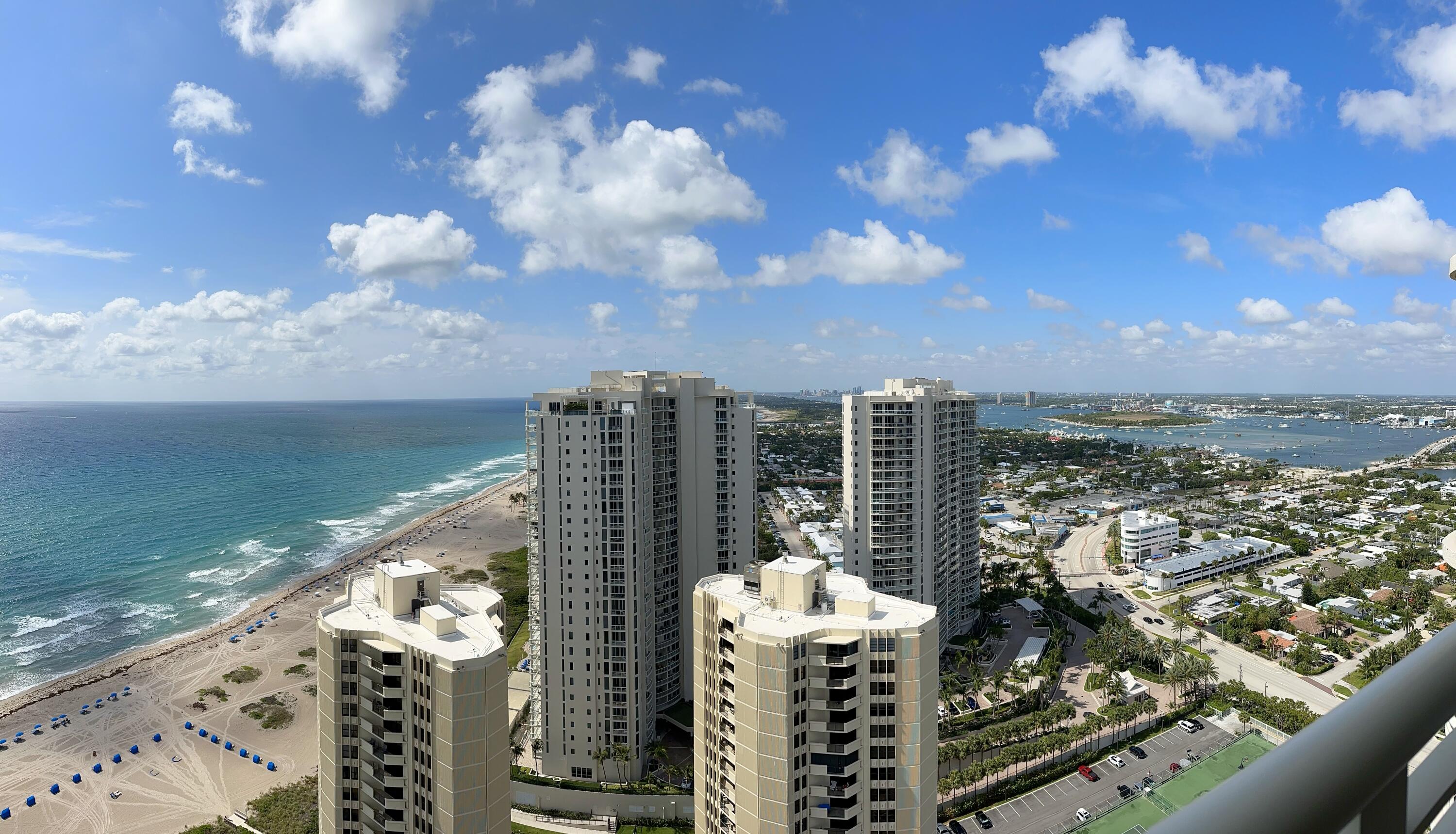 a view of a city with ocean