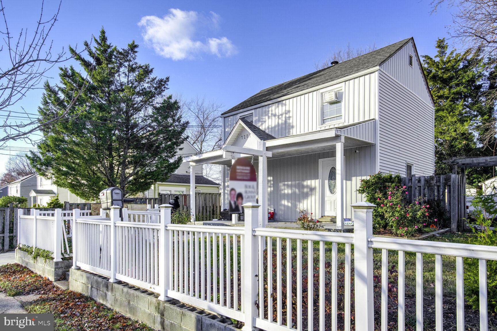 a front view of house with small garden