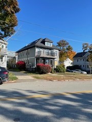 a view of a building with a street