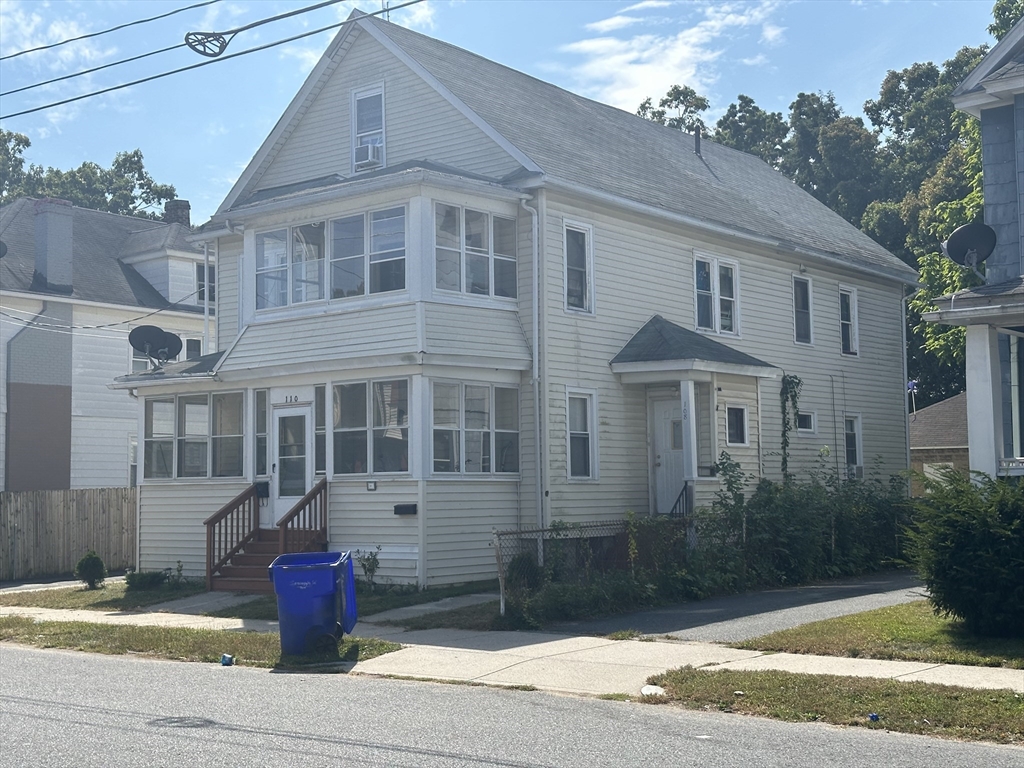 a front view of a house with porch