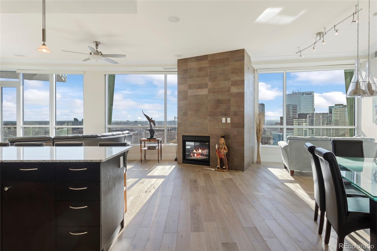 a large kitchen with a table and chairs