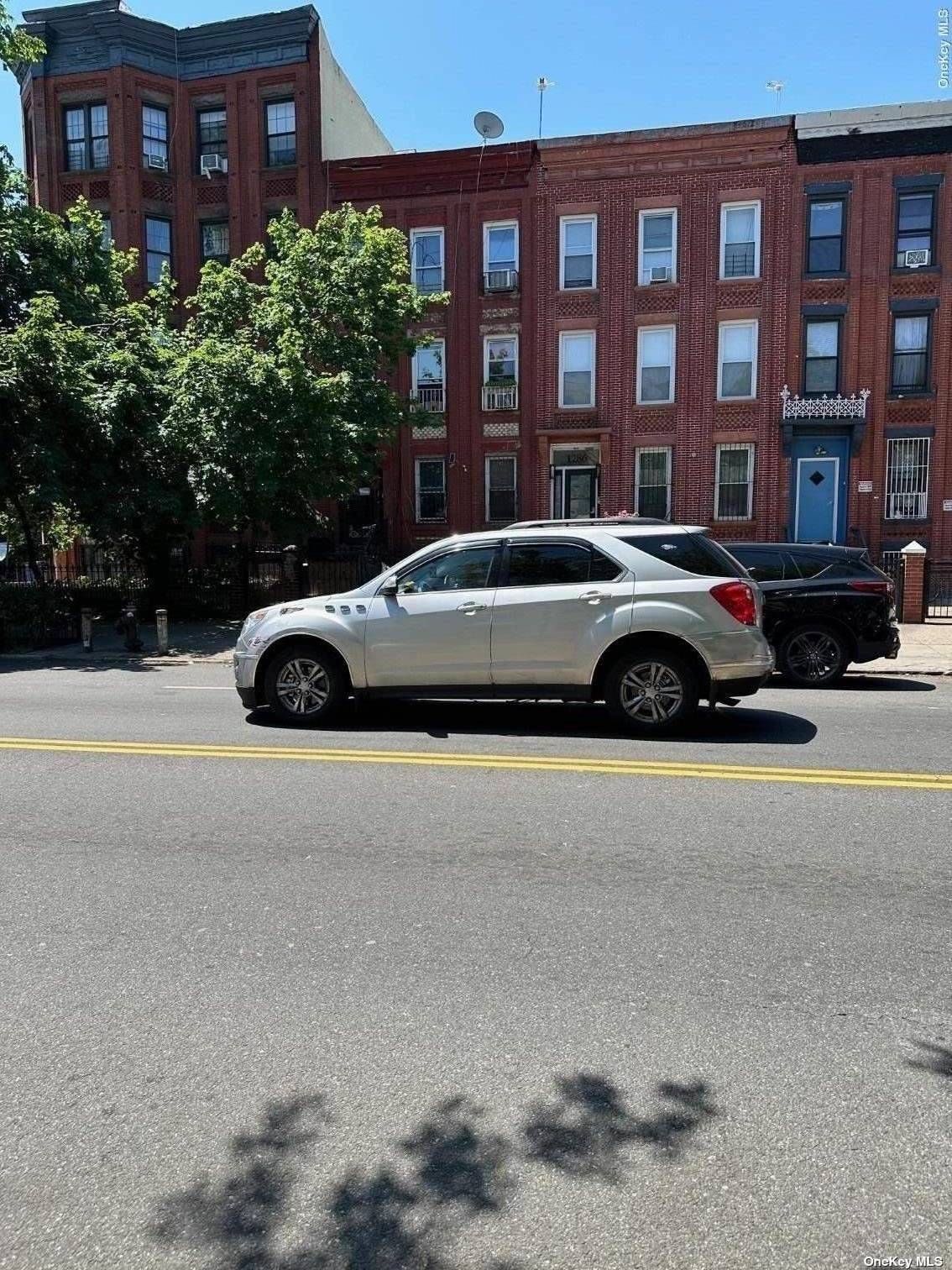 a car parked in front of a building