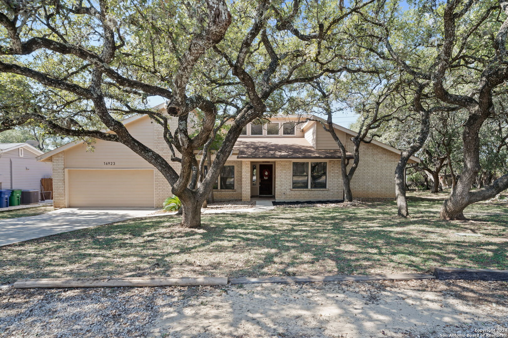 a house with trees in front of it