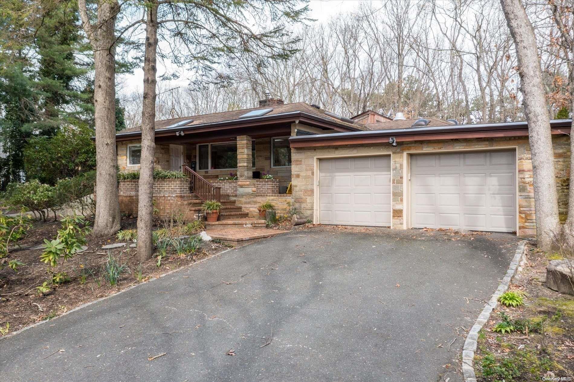 a house with trees in the background