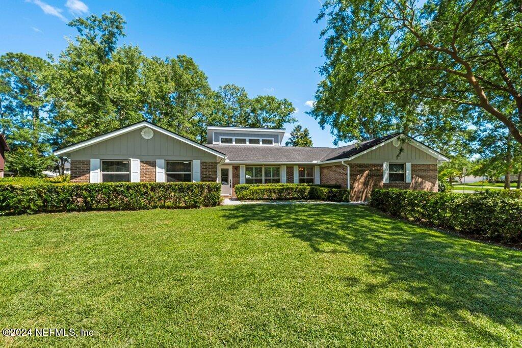 a front of house with a garden