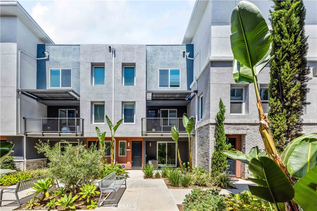 a front view of a multi story residential apartment building