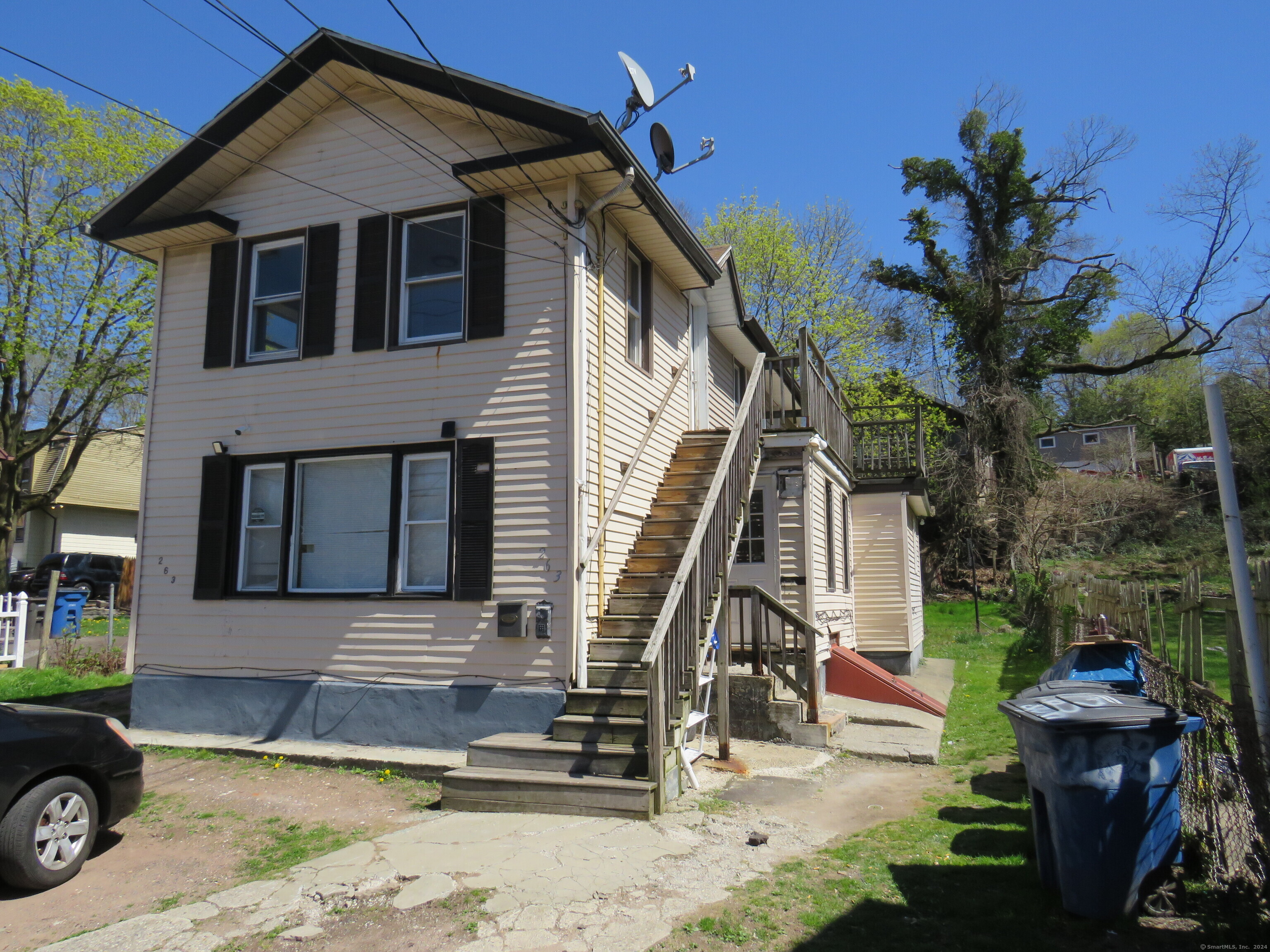 a front view of a house with entertaining space