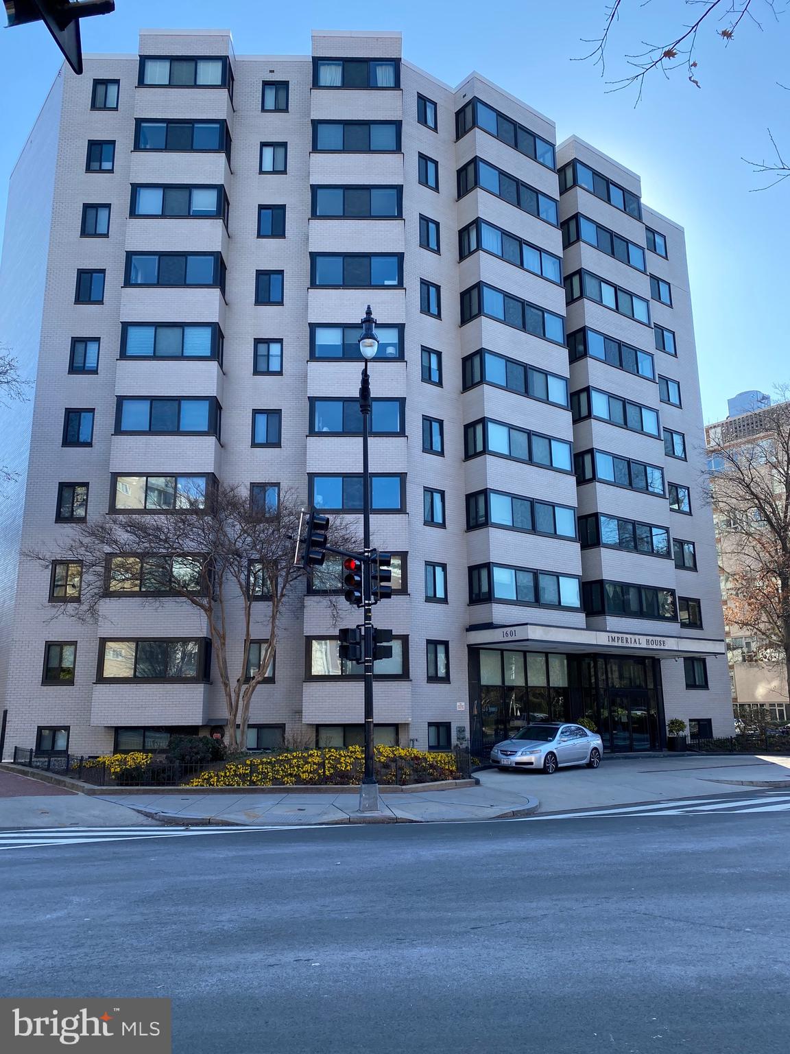 a building with streets and trees