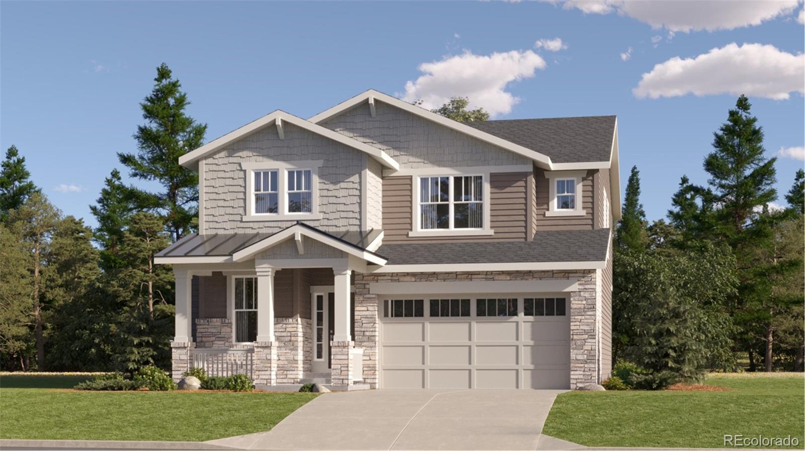 a front view of a house with a yard and trees