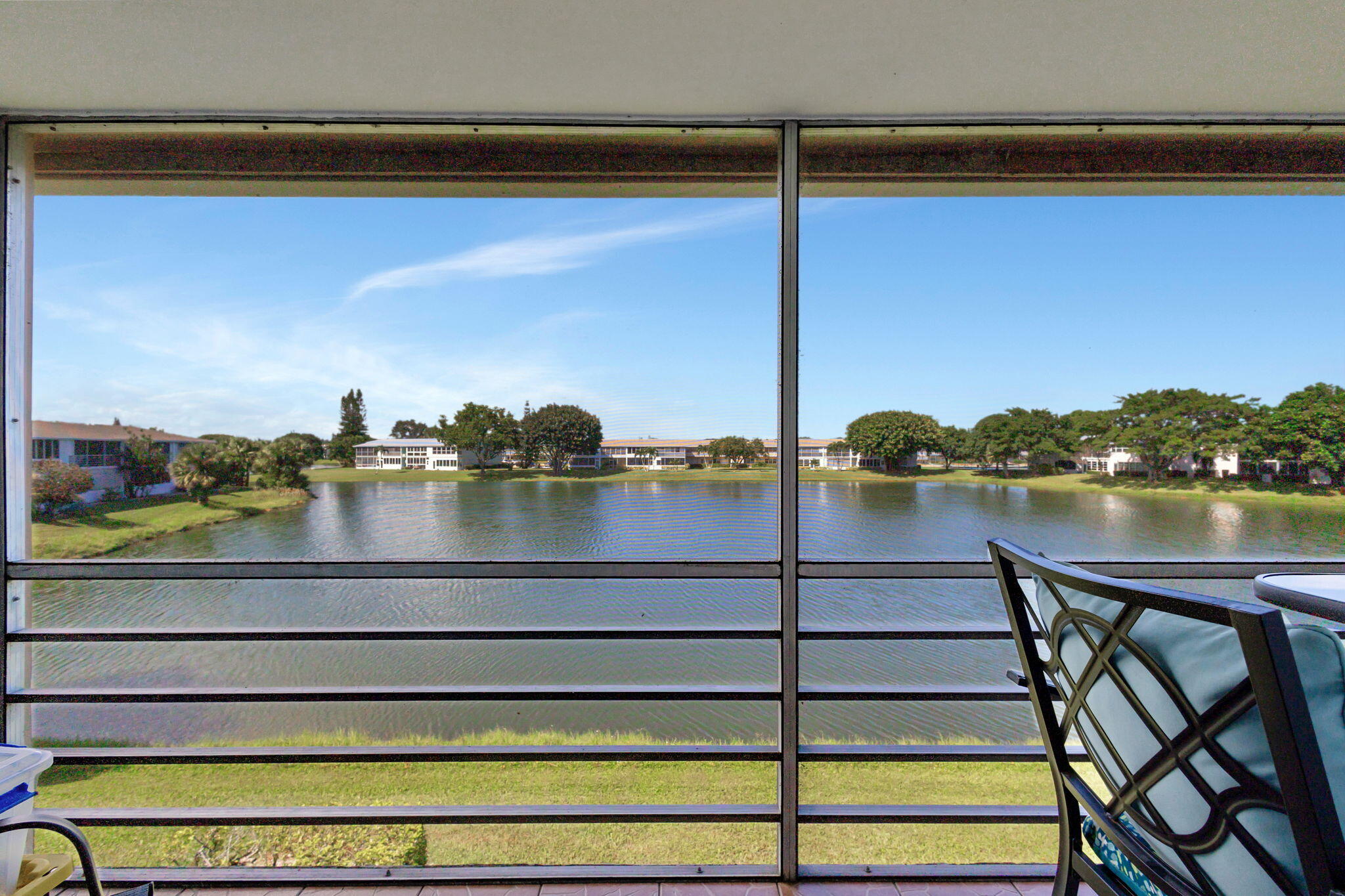 a view of a lake from a balcony