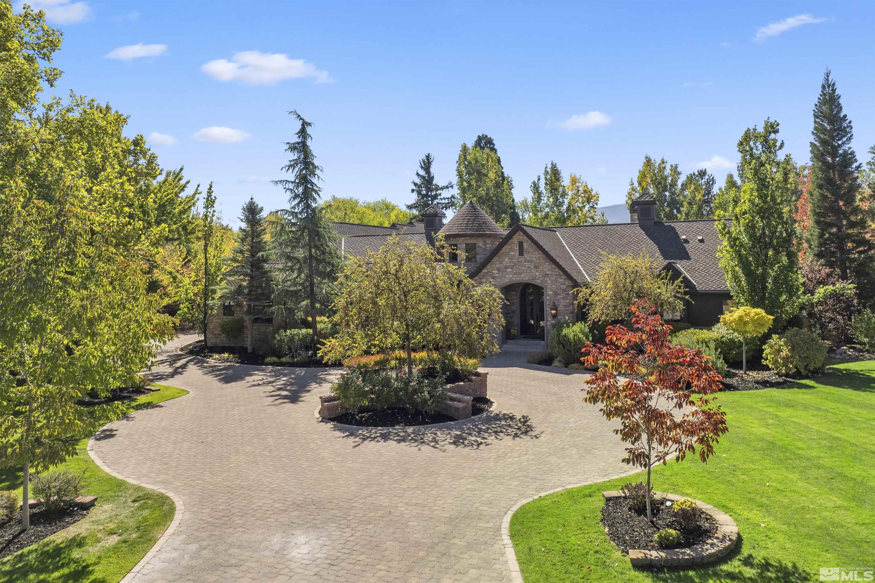 a backyard of a house with lots of green space