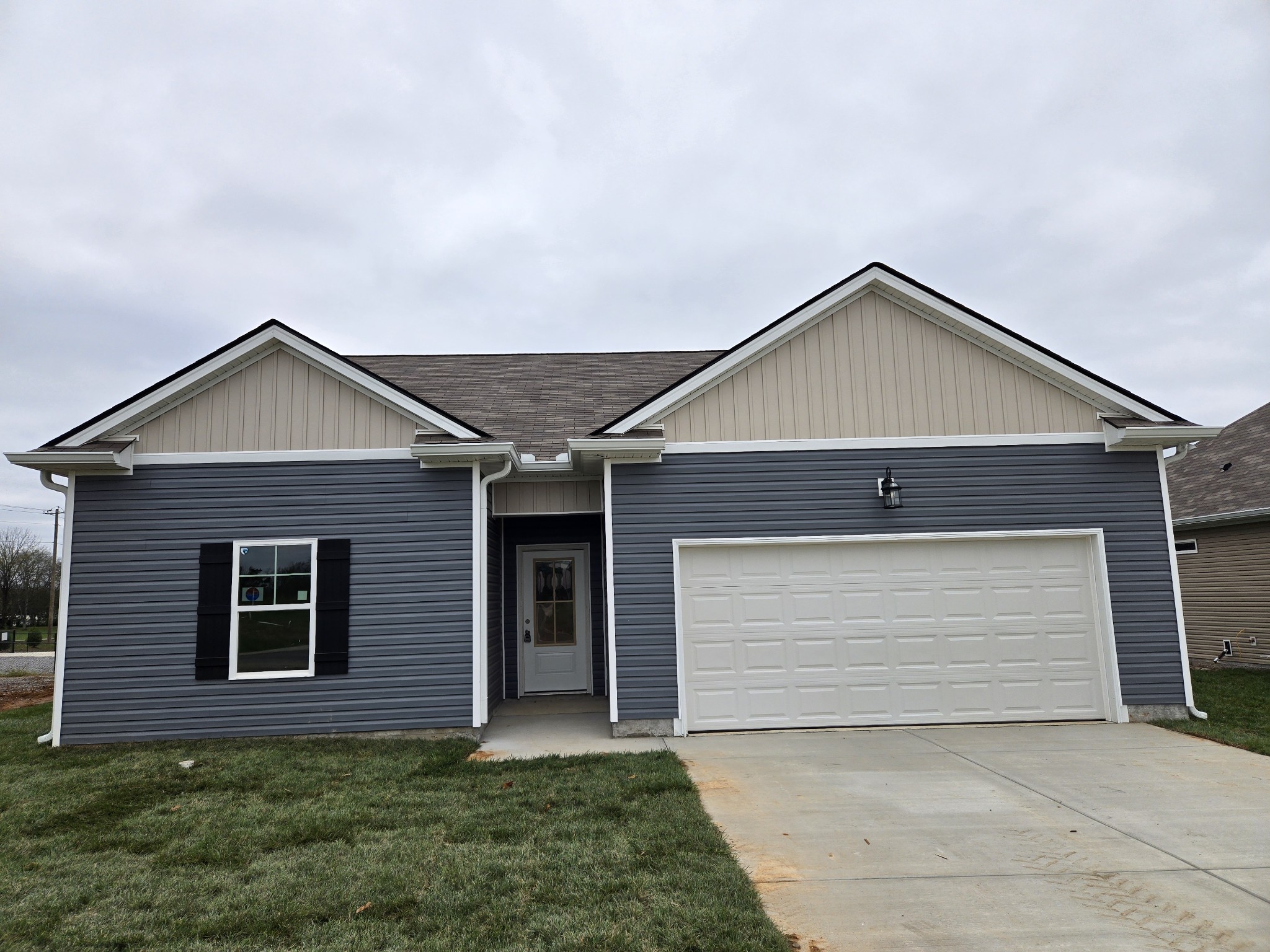 a front view of a house with a garage