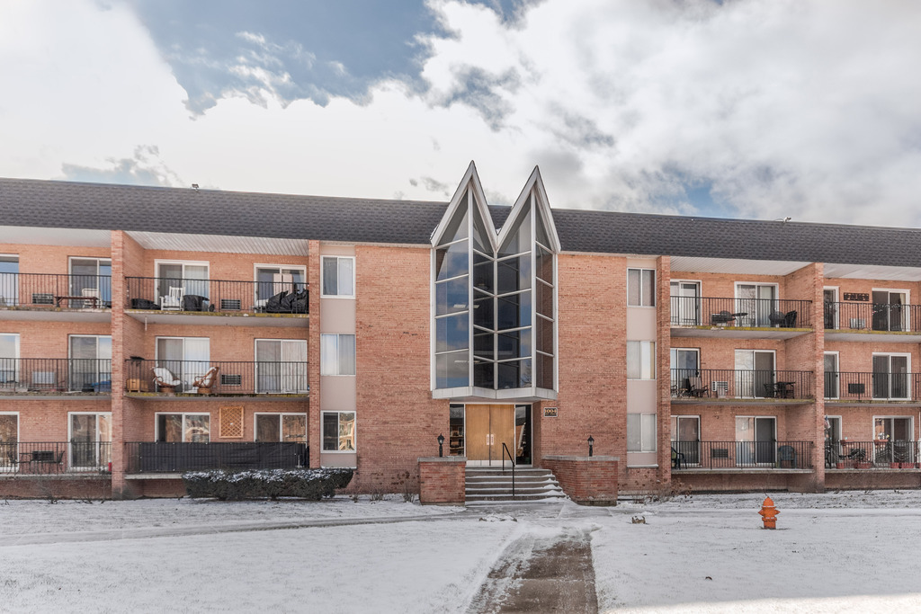 a front view of a building with street view