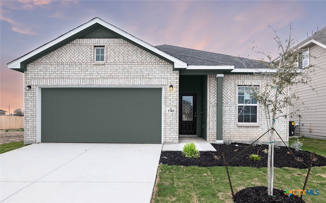 a front view of house with yard