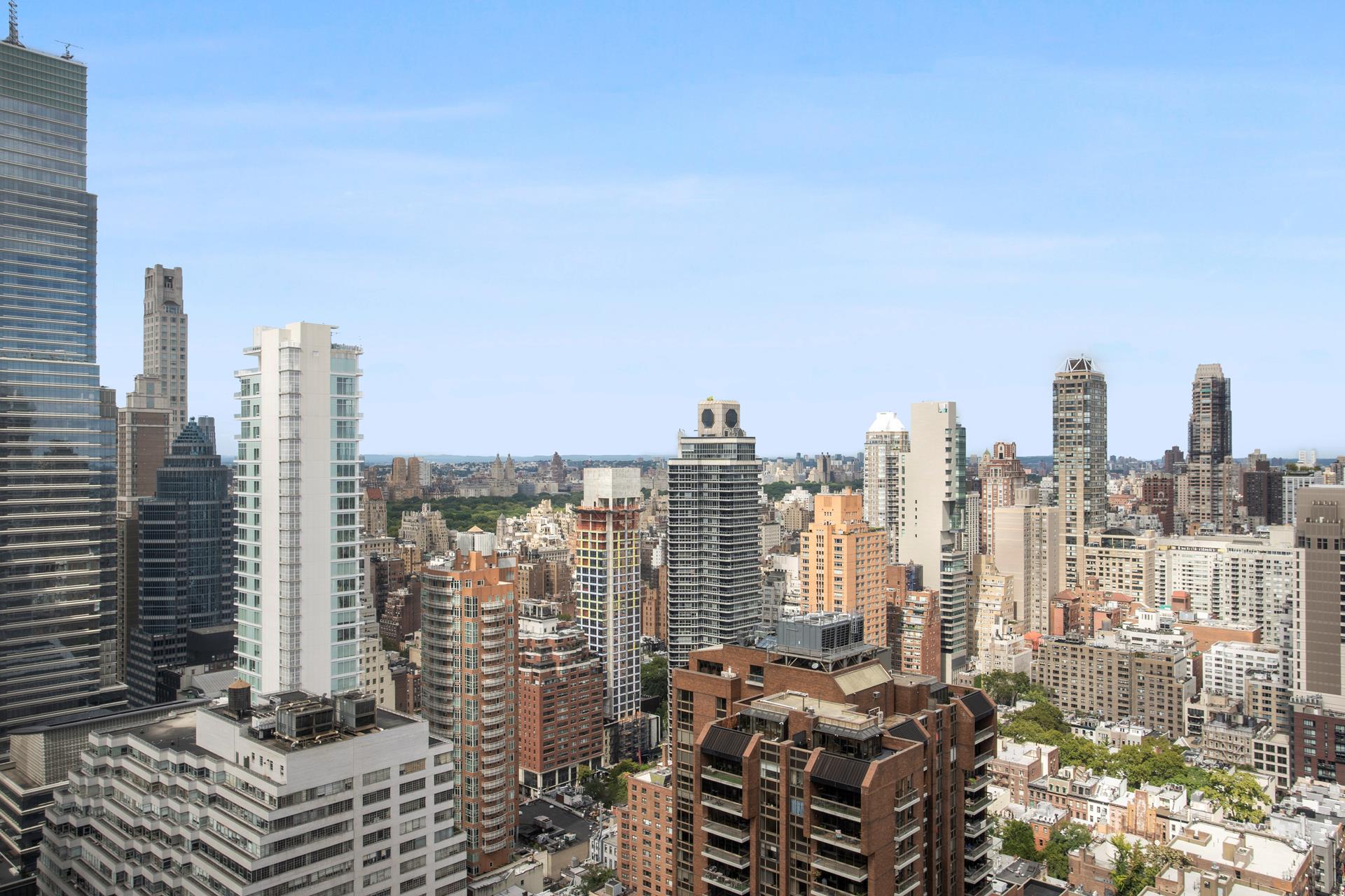 a view of city with tall buildings