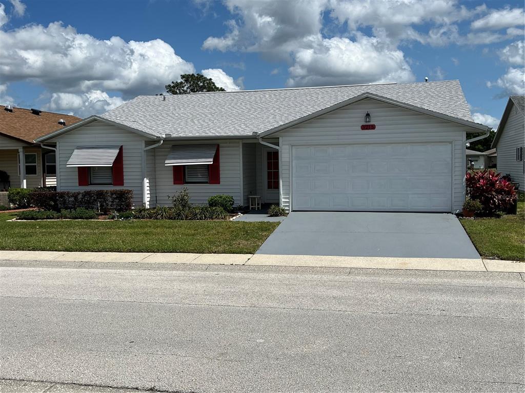 a front view of house with yard