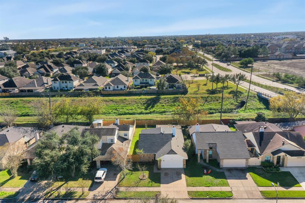 an aerial view of residential building with outdoor space