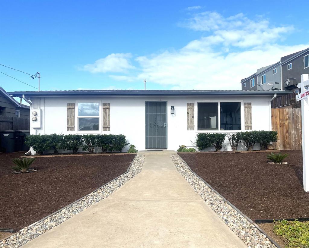 a view of a house with a patio