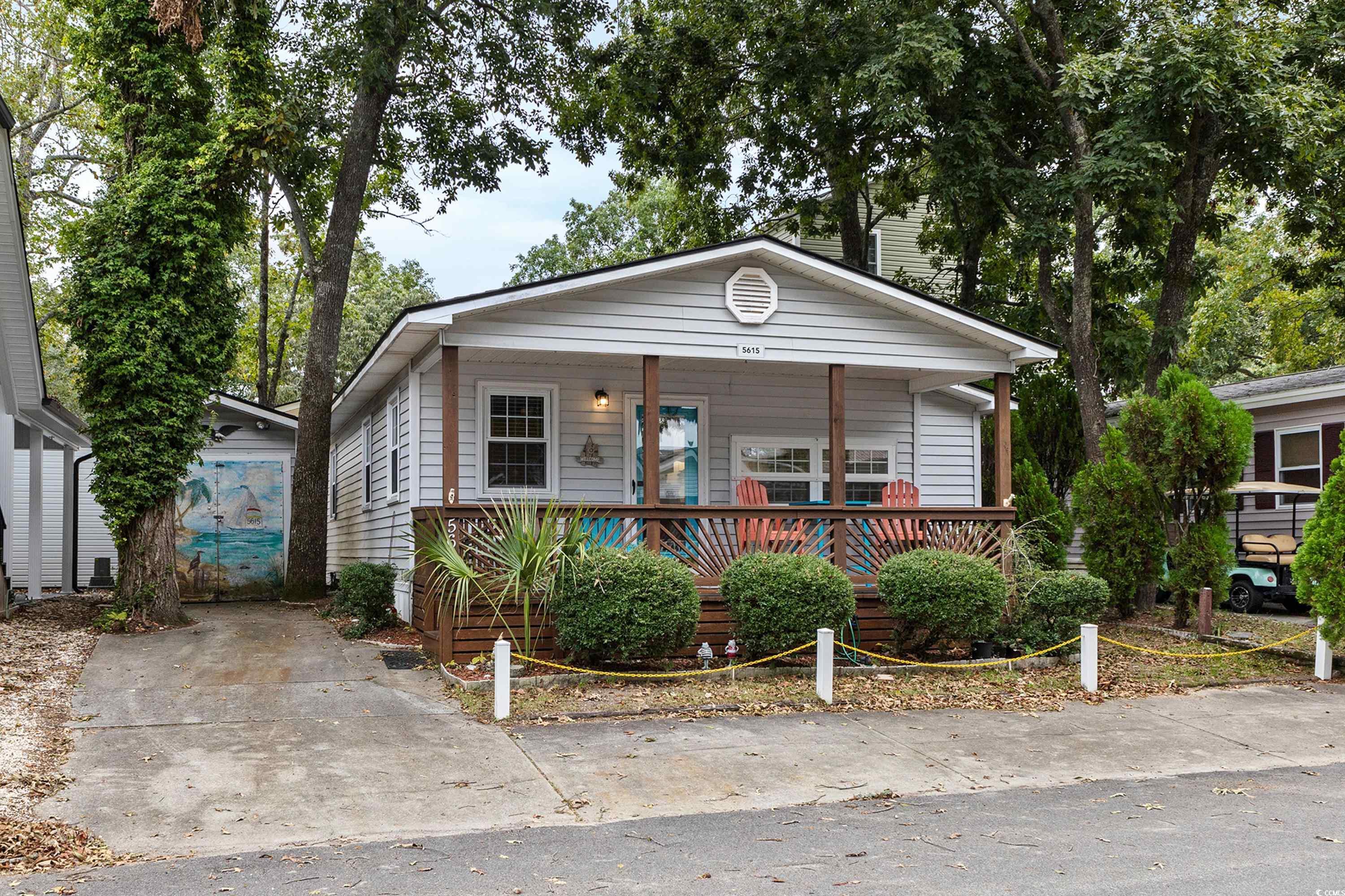 Bungalow-style house featuring covered porch