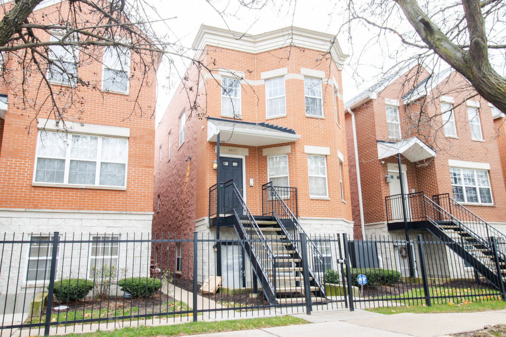 a front view of a multi story residential apartment building