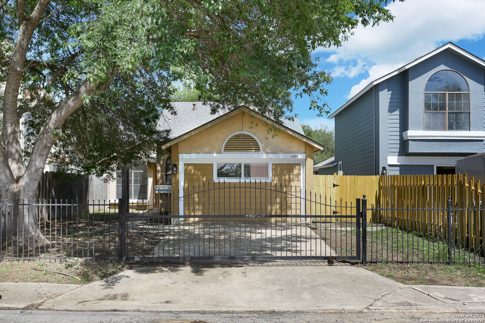 a front view of a house with garage