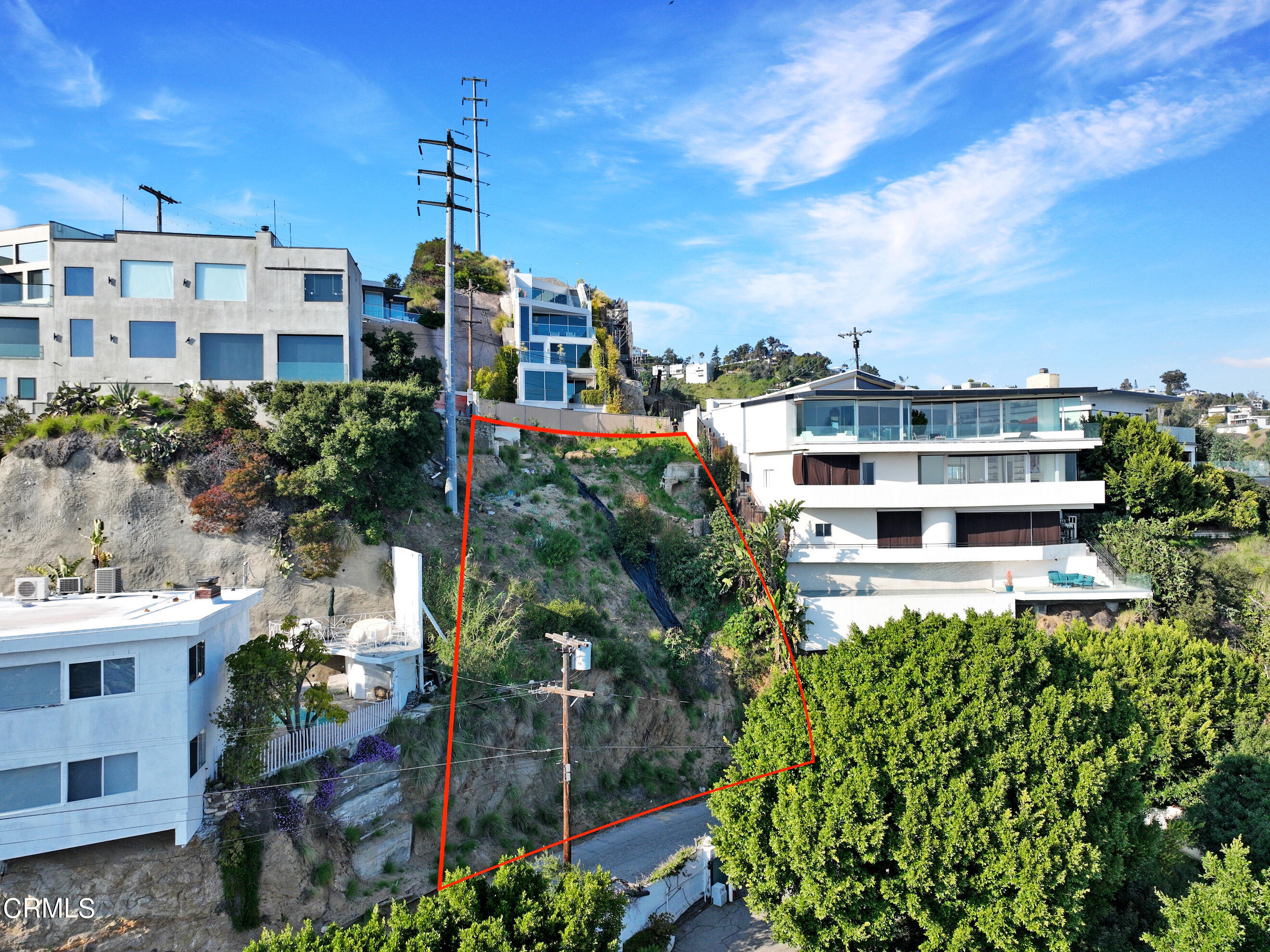 a front view of a multi story residential apartment building with a yard