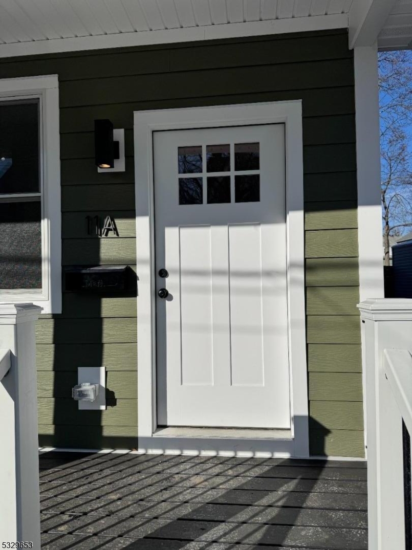 a view of entrance gate of a house