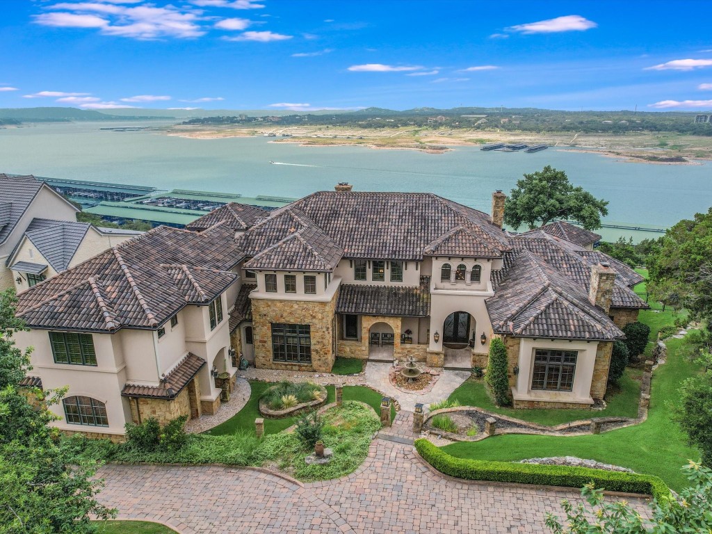 a front view of house with yard and outdoor seating