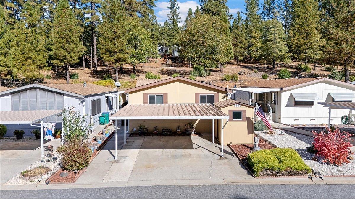 a aerial view of a house with a patio