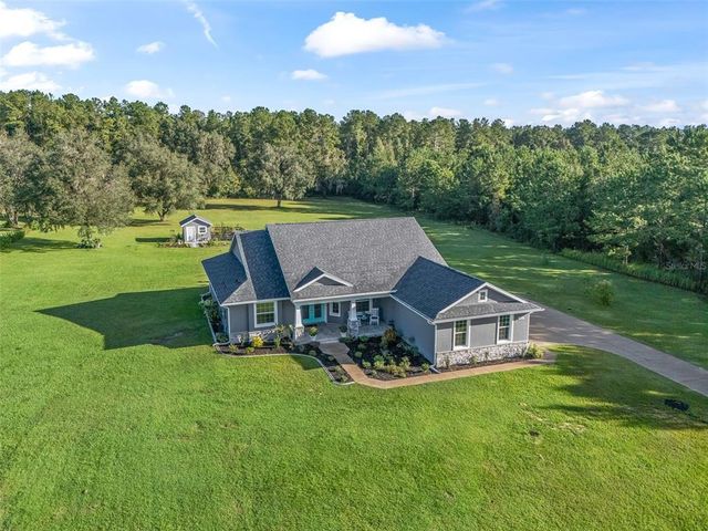 $736,680 | 14665 Northwest 148th Lane | The Village at Hidden Lakes