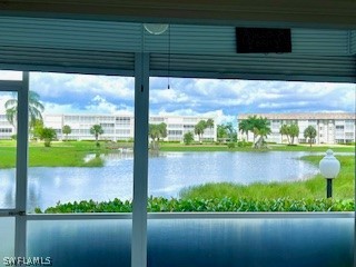 a view of a lake from a balcony