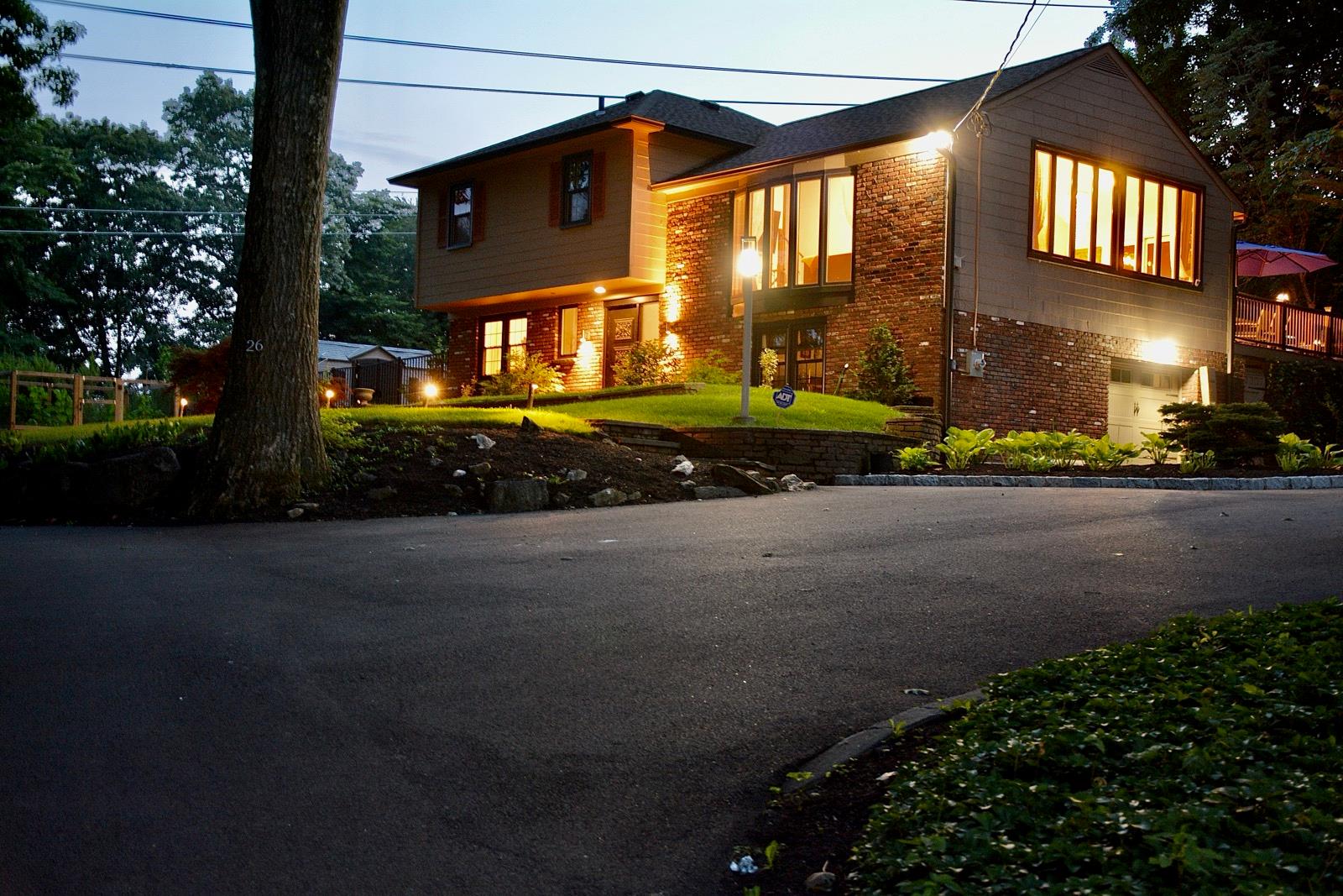 a view of a house with a yard