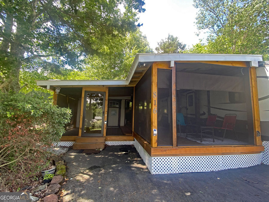 a front view of a house with a porch