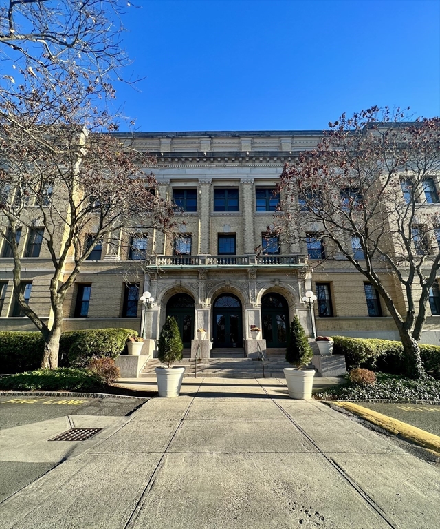 front view of a building with a street