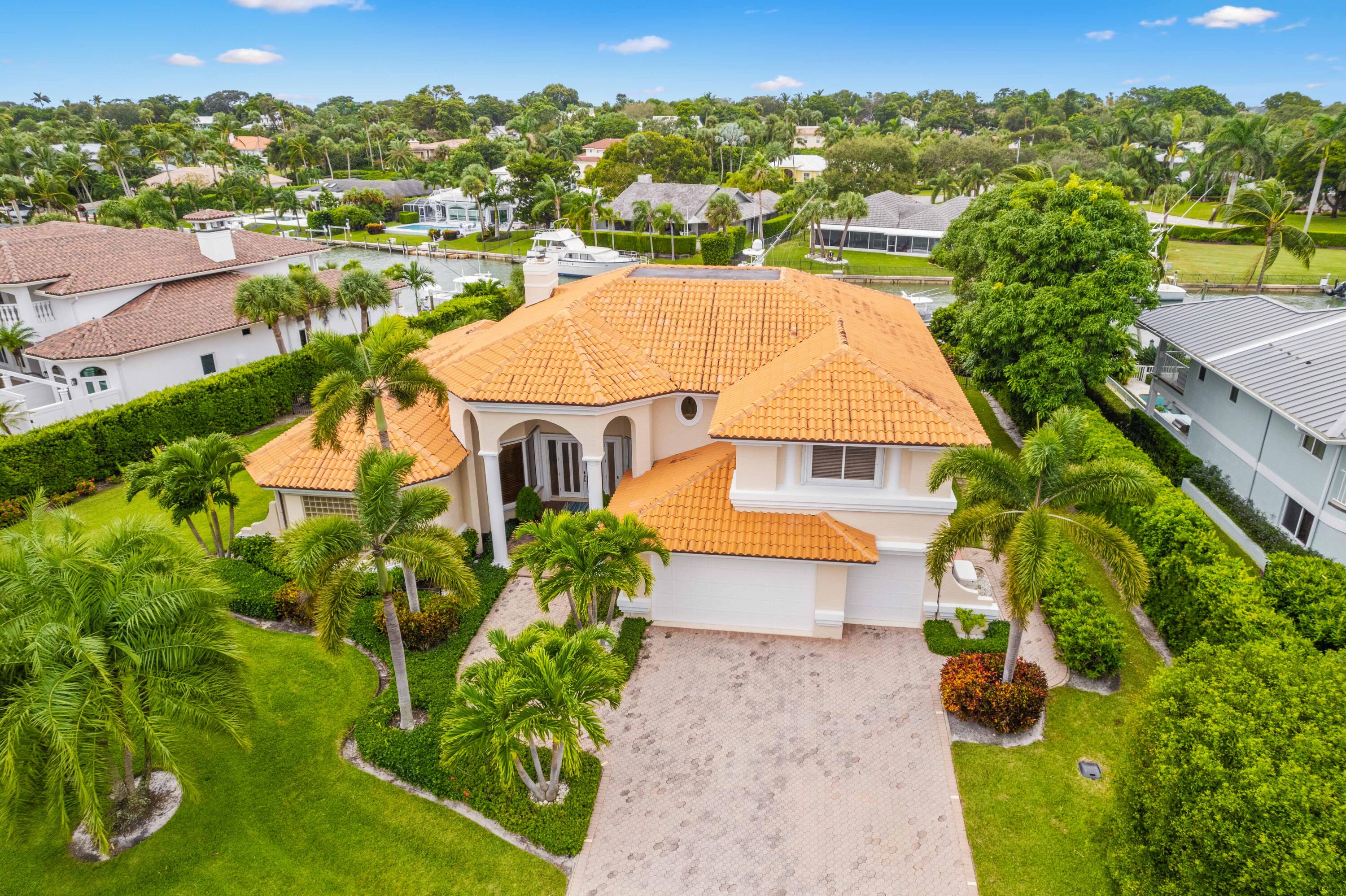 an aerial view of a house with a garden