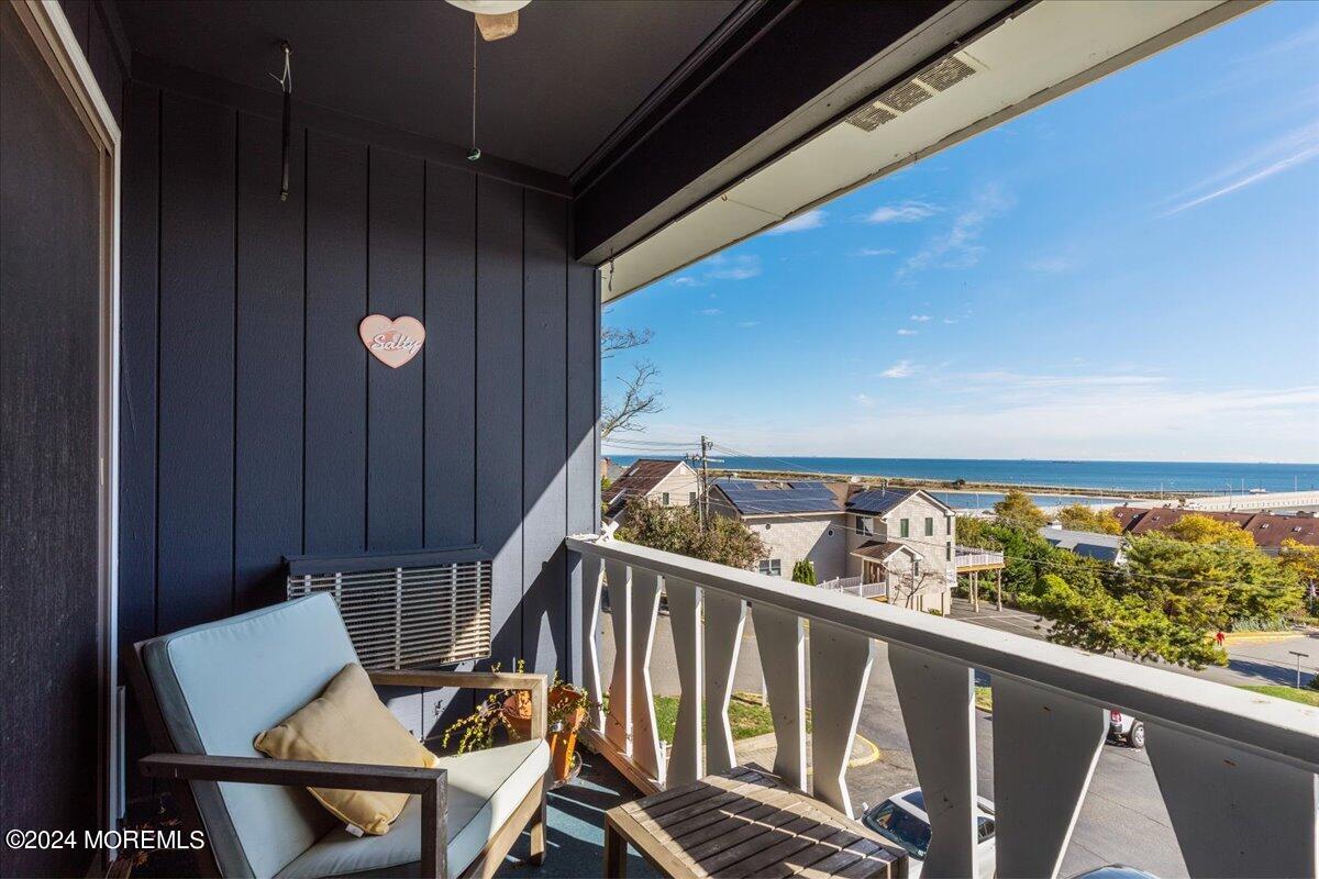 a view of balcony with furniture