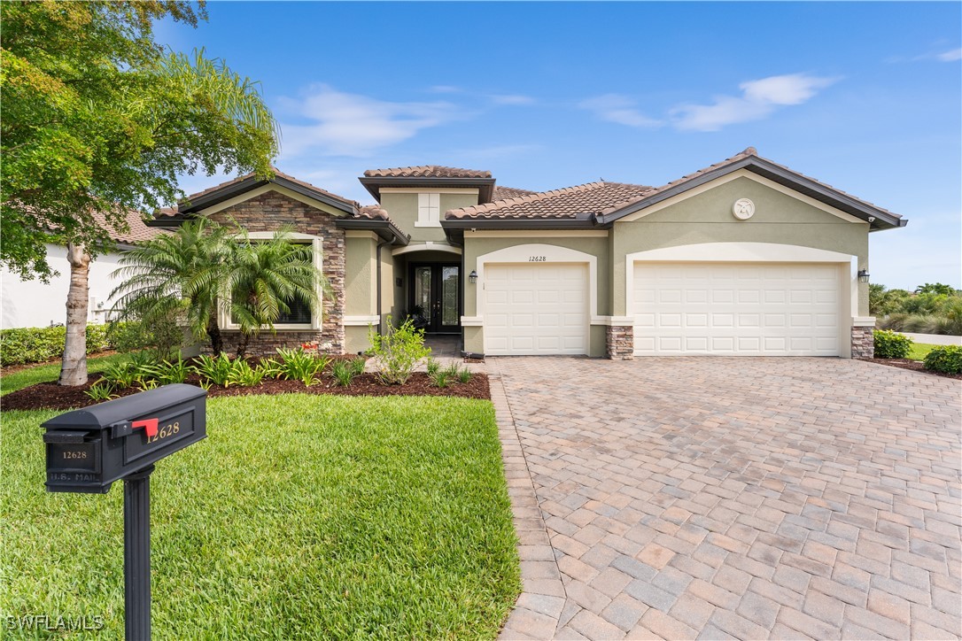 a front view of a house with yard