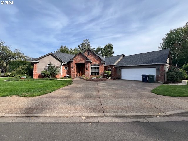 front view of house with a yard