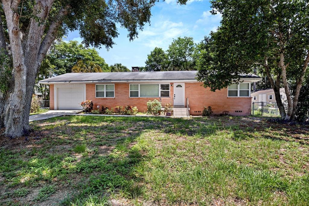 front view of a house with a yard